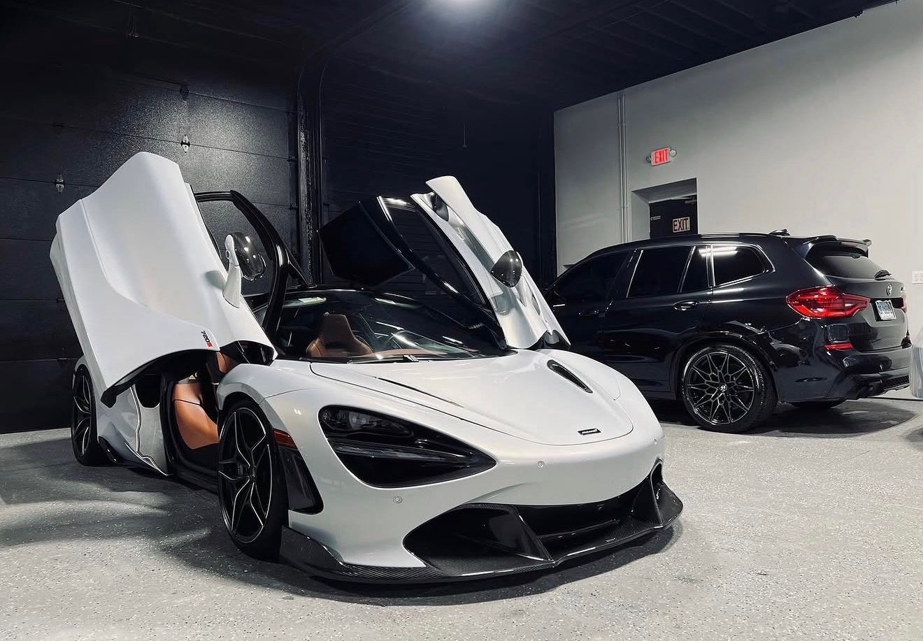 McLaren and BMW in Prime Automotive showroom